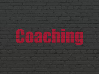 Studying concept: Coaching on wall background