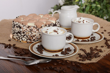 coffee with whipped cream and chocolate and coffee with cream cake