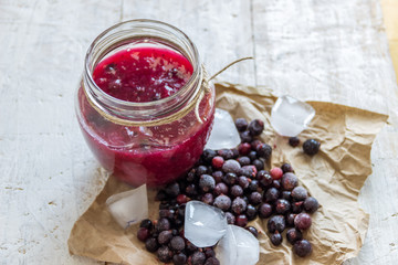 Jelly from black currant and berries . Autumn preservation. Healthy food.