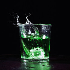 Green cocktail with splash