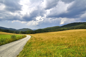 Fototapeta premium View of Beskid Niski from Hutnianska pass, Poland with dramatic sky