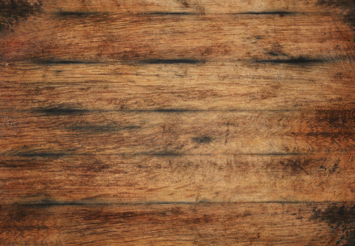 Old aged brown wooden planks background texture