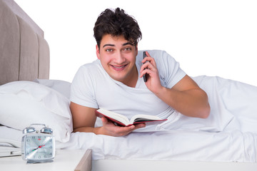 Man in bed suffering from insomnia