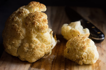 Baked cauliflower on a cutting board