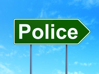 Law concept: Police on road sign background
