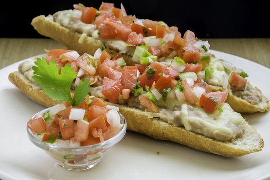 Authentic Mexican molletes with pico de gallo
