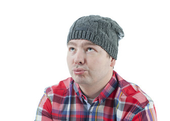 Caucasian man looking weird and funny with a hat on. The man isolated on white.