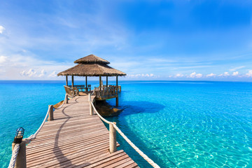 Beautiful summer tropical beach landscape, wooden pier, turquoise sea water - Powered by Adobe