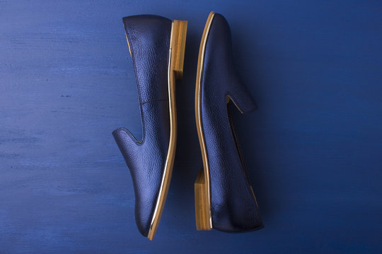 Blue shoes on a blue background. Women's shoes