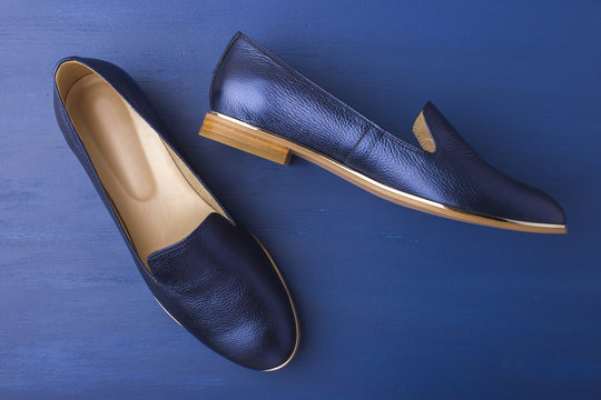 Blue shoes on a blue background. Women's shoes