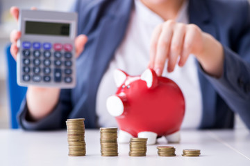 Businesswoman in pension savings concept