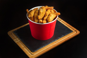 Bucket of chicken nagets.