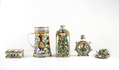 ISOLATED HUNGARIAN PAINTED CERAMICS ON WHITE BACKGROUND. VASE, CUP, GOURD IN STILL LIFE