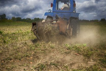 Fototapeta premium Tractor in the field