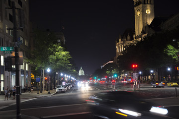 Pennsylvania Ave, Washington, DC. Dome of the U.S. Capitol is at center rear, Old Post Office Pavillion, now home to the Trump International Hotel, is at right.