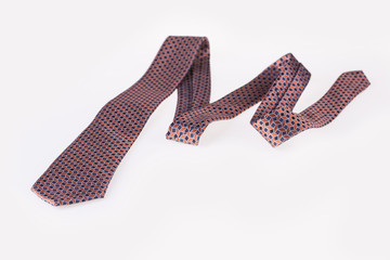 Tie in the shape of a snake on a white background.