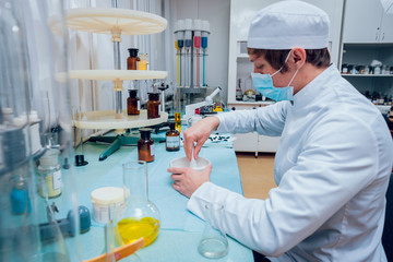 Science technician at work in the laboratory.