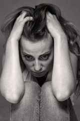 Everything is bad. Woman in depression alone with  problems (difficulties, psychology, body language, gestures, loneliness concept)