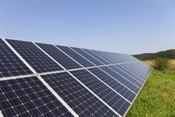 Solar Power Station on the summer flowering Meadow 