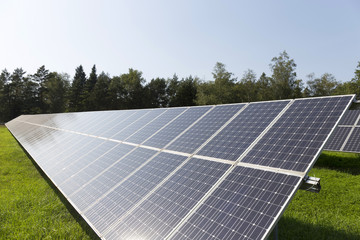 Solar Power Station on the summer flowering Meadow 