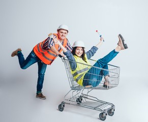 Happy young couple went shopping for the construction and repair of a new home.