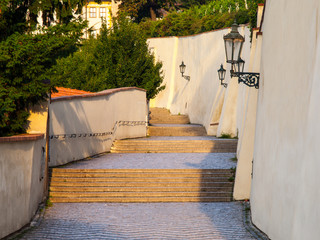 Old Castle Stairs on Prague Castle. Medieval stairway with vintage lamps, Prague, Czech Republic.