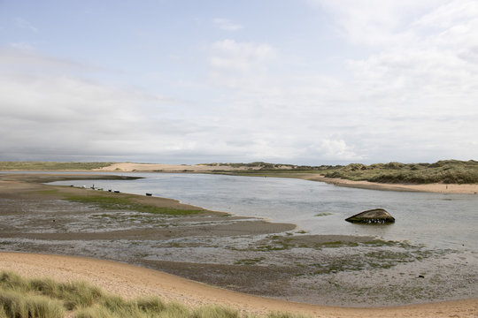 Shipwreck in shallow river estuary