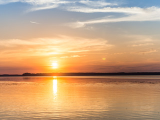 Fototapeta na wymiar Sunset over lake