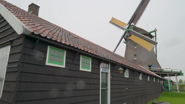 2071_The_view_of_the_small_house_with_the_windmill.mov