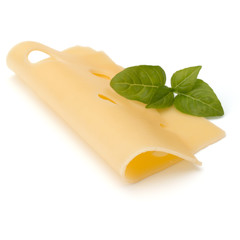 Cheese and basil leaves isolated on white background