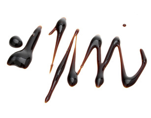 Balsamic vinegar cream isolated on white background. Italian salad dressing, sauce.