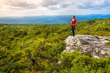 Woman enjoys the nature at High Point, on top of Shawangunk Ridge, in Upstate New York.