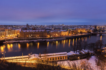 Fototapeta na wymiar Winter in Prague - bridges on Vltava River