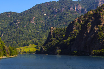 A sharp cliff near a lake