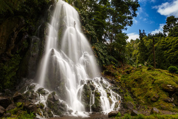 Wide angle shot of a waterfall in the Parque Natural Ribeira dos Caldeiroes in Sao Miguel, The Azores, Portugal