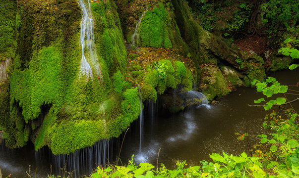 A wide angle shot of the very unusual and exquisite Bigar Waterfall, ranked by various renowned publications as the most beautiful waterfall in the world.