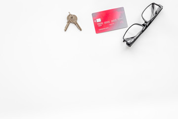 selling property online with credit card on office desk white background top view mockup