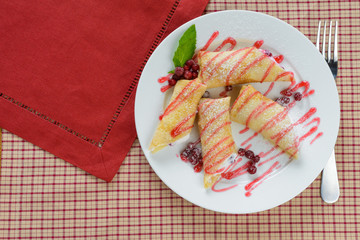 Pancakes with curd and berries
