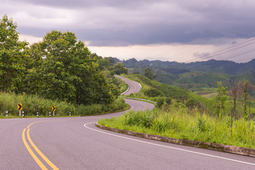 Mountain view along the road with cloud sky at Nan Thailand