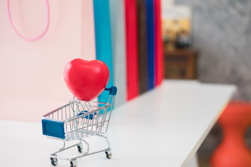 sale, consumerism, advertisement and retail concept - many colorful shopping bags