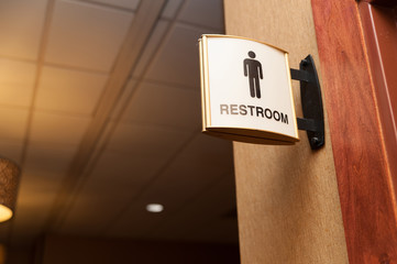 Public men restroom sign close up image