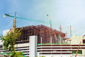 Naklejka premium industrial building use tower crane in construction site