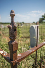 Rusty Fence Post at Cemetery