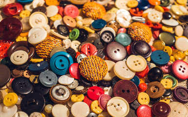 Scattering of colorful old buttons
