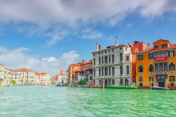 Views of the most beautiful canal of Venice - Grand Canal water streets, boats, gondolas, mansions along. Italy.