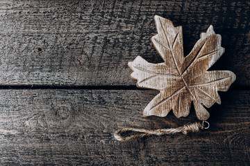 Symbol of Canada - Wooden Maple leaves on wooden background