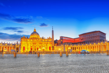 Fototapeta na wymiar St. Peter's Square and St. Peter's Basilica, Vatican City in the evening time.Italy.