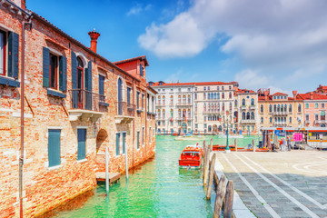 Views of the most beautiful canal of Venice - Grand Canal water streets, boats, gondolas, mansions along. Italy.