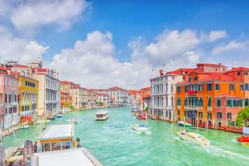 Views of the most beautiful canal of Venice - Grand Canal water streets, boats, gondolas, mansions along. Italy.