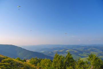 Mountain landscape with paragliders. Ukrainian Carpathians, Europe.